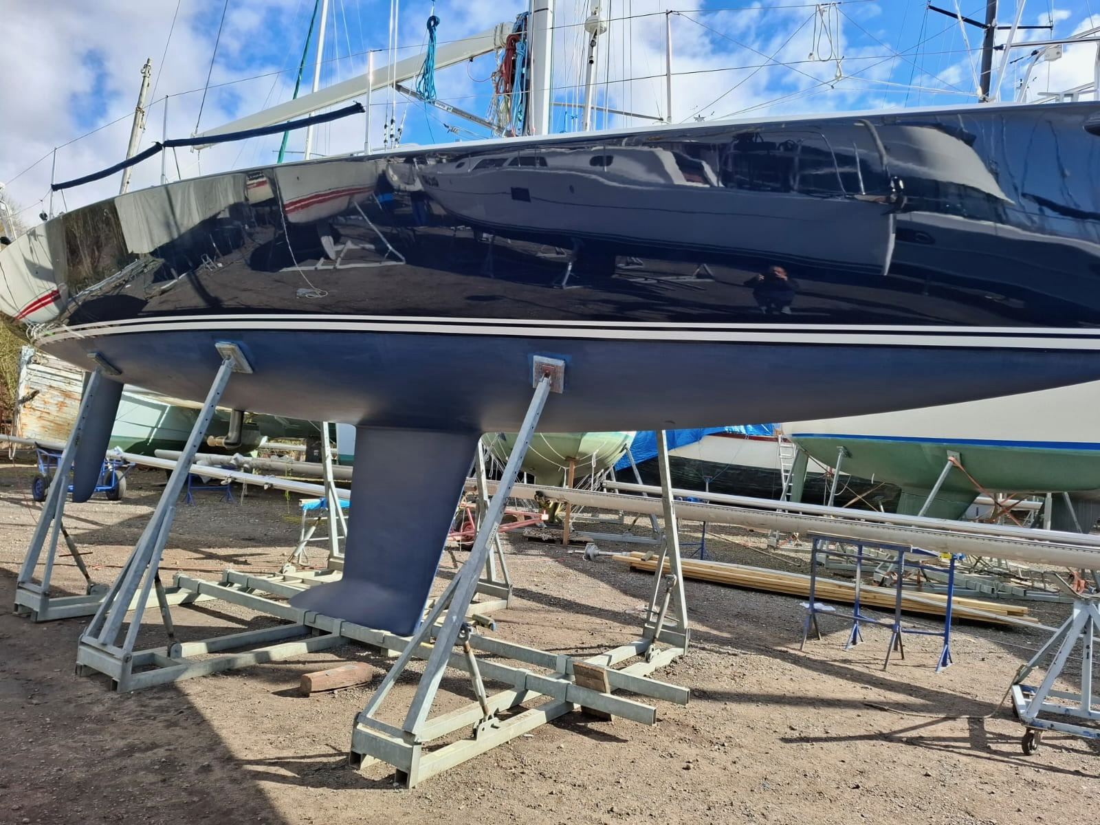 Yacht hauled out on stands for survey